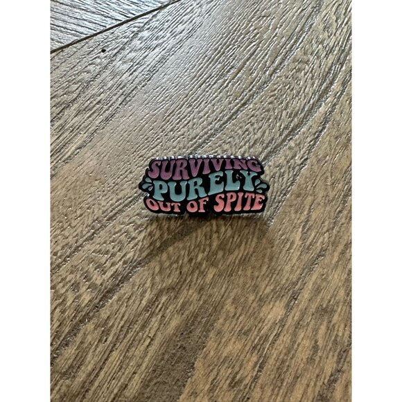 SURVIVING OUT OF SPITE Funny Enamel Lapel Pin NEW - Picture 1 of 3
